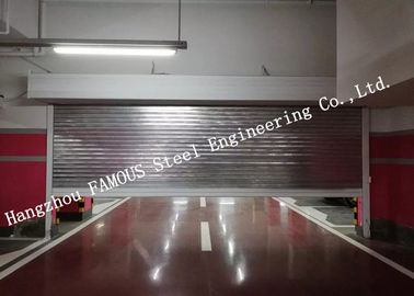 จีน ประตูโรงรถอุตสาหกรรมชุบสังกะสีอัตโนมัติประตูม้วนลูกกลิ้งเหล็กหนักสำหรับใต้ดิน ผู้ผลิต