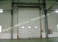 ประตูโรงรถอุตสาหกรรมชุบสังกะสีอัตโนมัติประตูม้วนลูกกลิ้งเหล็กหนักสำหรับใต้ดิน ผู้ผลิต
